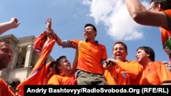 Dutch fans celebrate in the fan zone in Kyiv on June 8.