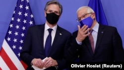 U.S. Secretary of State Antony Blinken (left) with European Union foreign policy chief Josep Borrell ahead of meetings in Brussels on March 24 