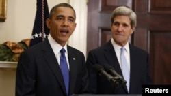 U.S. President Barack Obama (left) announces the nomination of Senator John Kerry on December 21.