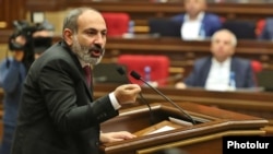 Armenian Prime Minister Nikol Pashinian speaks to parliament on October 24. 