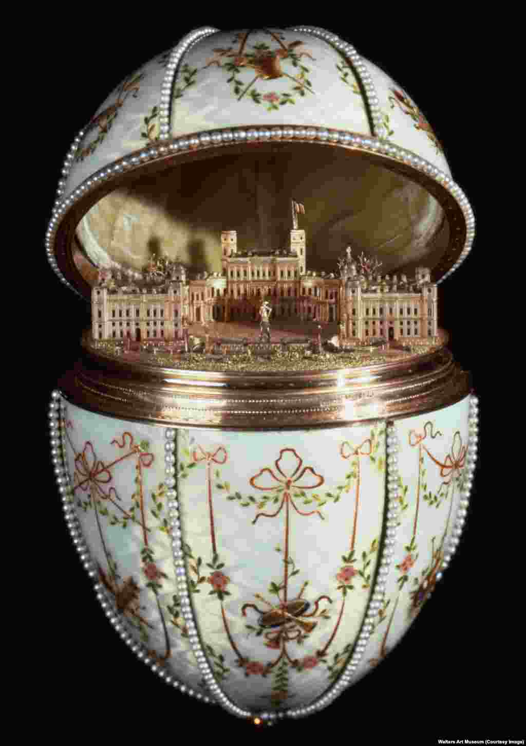 The tsar&#39;s one request for the eggs was that they contain some kind of &quot;surprise.&quot; In the case of the Gatchina Palace Egg, the egg opened to a gold replica of the royal residence in the countryside of St. Petersburg. The 8-centimeter building is precise down to the hedges, gravel courtyard, and fluttering flag of the real palace.