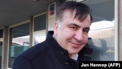 Mikheil Saakashvili stands in front of the Immigration and Naturalization offices in Rotterdam on February 14.