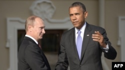 President Vladimir Putin (left) with his U.S. counterpart Barack Obama (file photo)