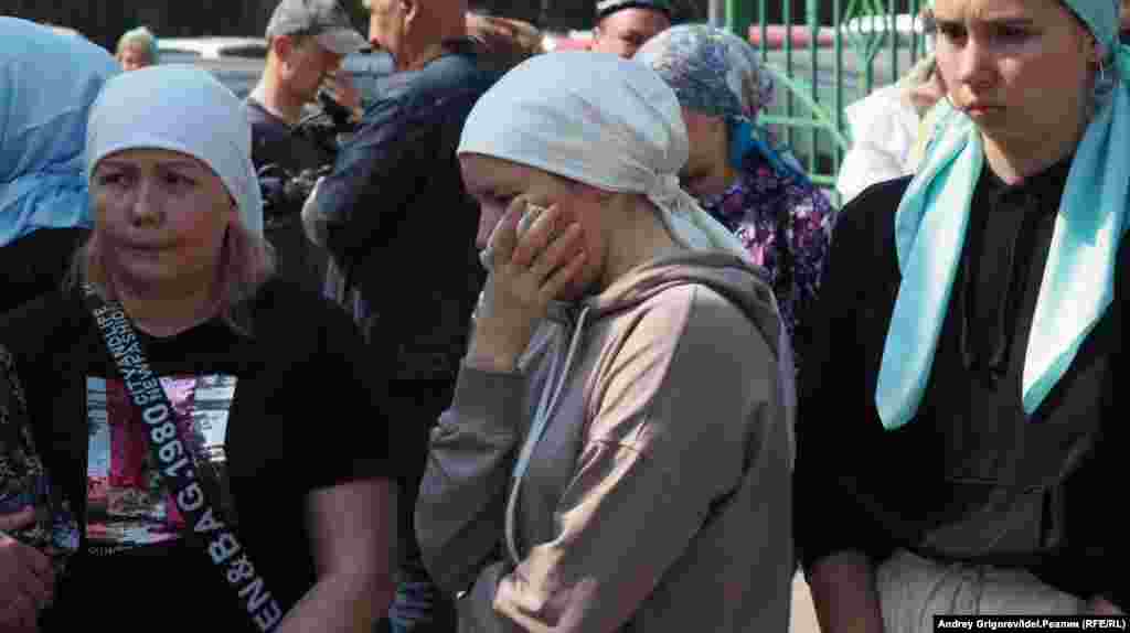 Victims&#39; families react during the students&#39; funeral.