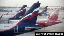 Passenger planes of the Aeroflot and Rossiya airlines are parked at Sheremetyevo airport in May 2021.