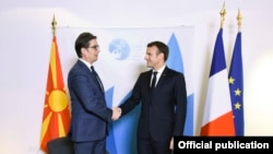 French President Emmanuel Macron (left) meets in Paris with the president of North Macedonia, Stevo Pendarovski. (file photo)