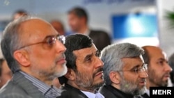 Iran's chief nuclear negotiator, Said Jalili (second from right), next to President Mahmud Ahmadinejad (second from left)