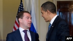 U.S. President Barack Obama (right) speaks with Russian President Dmitry Medvedev during a meeting at the U.S. ambassador's residence in London on April 1.