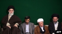 Supreme Leader Ayatollah Ali Khamenei, President Mahmud Ahmadinejad, and Expediency Council Chairman Ali Akbar Hashemi Rafsanjani with an unidentified cleric (left to right) at a memorial ceremony in Tehran on March 23, 2009.