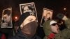 Russians Honor Slain Activists, Moderation