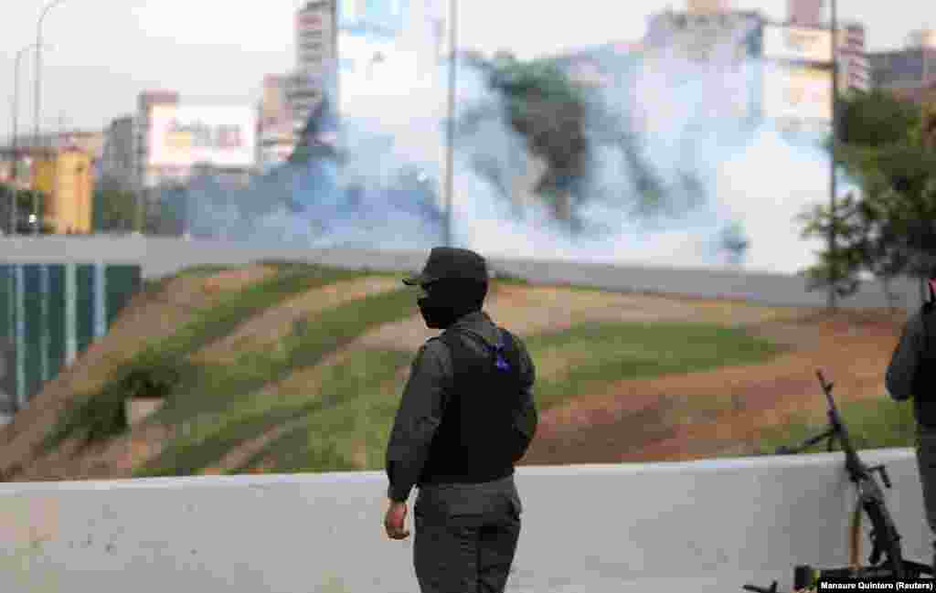 Tear gas floats in the air near the air base.&nbsp;