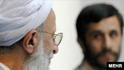 Ayatollah Mohammad Taqi Mesbah-Yazdi (left) meets with President Mahmud Ahmadinejad in Qom in 2007.