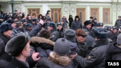 Demonstrators clash with police during a rally in Kazan last week, after the death of a suspect in police custody.