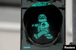 Karl Marx's figure has been used for traffic lights in Trier.