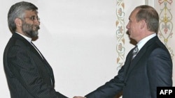 Vladimir Putin (right) and Said Jalili, Iran's chief nuclear negotiator, at a meeting in Russia in 2007