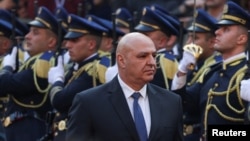 Lebanon's army chief Joseph Aoun walks after being elected as the country's President at the parliament building in Beirut, January 9