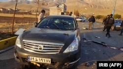 The aftermath of the attack that killed Iranian nuclear scientist Mohsen Fakhrizadeh near Tehran on November 27. 