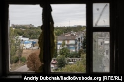 A window damaged by shelling in Sofia's five-story Krasnohorivka apartment building.