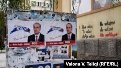 Campaign posters line streets, as the first early parliamentary elections begin in Kosovo. 