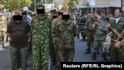 Ukrainian prisoners are paraded by pro-Russian separatists on Ukrainian Independence Day in the eastern city of Donetsk on August 24.