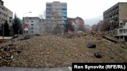 Barricades erected by Serbs on the north side of the central bridge in Mitrovica prevent cars from crossing.