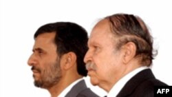 Algerian President Abdelaziz Bouteflika (right) with Iranian President Mahmud Ahmadinejad (file photo)