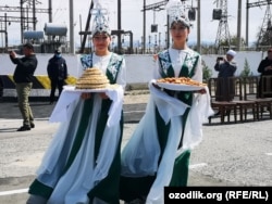 Kyrgyz women wearing traditional clothing attend an event in the Uzbek exclave of Sokh.