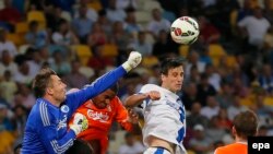 Dnipro's Nikola Kalinic (white shirt) goes for a header against FC Copenhagen in Kyiv last year.