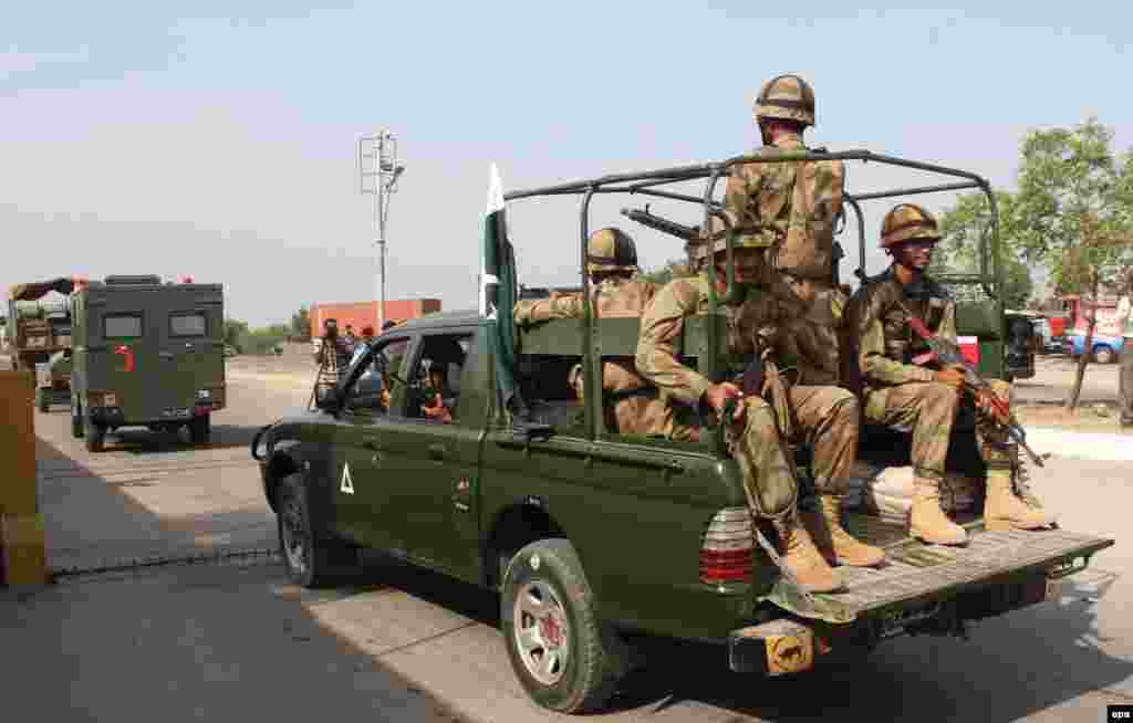 Pakistani Army rescue and relief teams leave Karachi for the earthquake-hit areas in Balochistan Province.