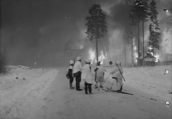 Buildings burn in a suburb of Helsinki.