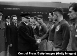 British Labour Party politician Albert Victor Alexander greets members of the Dynamo Moscow team before their game against Chelsea at Stamford Bridge.