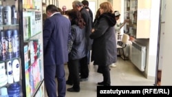 Customers line up for medicine at a Yerevan pharmacy on February 28, 2018.