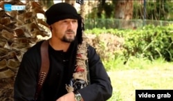 A screen grab of former Tajik Colonel Gulmurod Halimov in an IS propaganda video from 2015.