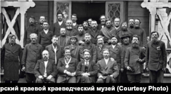 A group of electors to the State Duma from the Yenisei region pose for a photo.