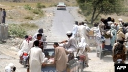 Suspected Pakistani Taliban militants fleeing a conflict zone in June