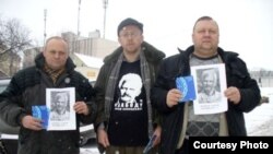 Three Belarusian human rights activists were convicted of participating in an unauthorized demonstration after a picture of them appeared online. 