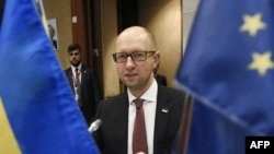 Ukrainian Prime Minister Arseniy Yatsenyuk attends a EU-Ukraine Association Council in Brussels in December 2015