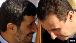 Iranian President Mahmud Ahmadinejad (left) with his Syrian counterpart, Bashar al-Assad, at a meeting of the Organization of the Islamic Conference in Istanbul in 2009