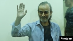 Zhirayr Sefilian greets supporters during his trial in Yerevan in June 2017.