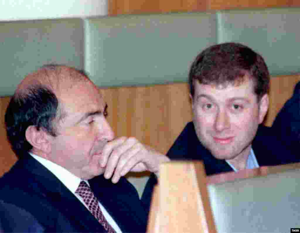 Oil and media tycoon Boris Berezovsky (left) with his fellow oligarch Roman Abramovich at a meeting of Duma deputies in December 1999. In 2012, Berezovsky lost a $5.1 billion lawsuit against Abramovich in a dispute over shares in the oil firm Sibneft.