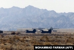 Two U.S. CH-47 Chinook helicopters on the ground at Pakistan’s Shamsi Airfield in 2002. It later emerged that the airfield was being used to launch U.S. drone strikes against Al-Qaeda targets in Pakistan’s tribal regions.