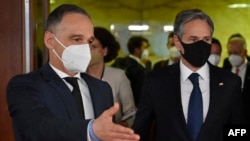 German Foreign Minister Heiko Maas (left) and U.S. Secretary of State Antony Blinken arrive to address a joint press conference following talks in Berlin on June 23. 