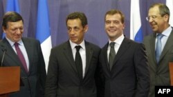 Russian President Dmitry Medvedev (2nd right) and French President Nicolas Sarkozy (2nd left) -- do common values exist?