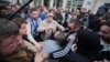 Poroshenko, Zelenskiy Supporters Briefly Clash Outside Challenger’s Kyiv Headquarters