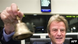 French Foreign Minister Bernard Kouchner opens the meeting in Luxembourg.