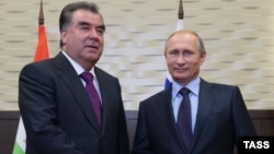 Tajik President Emomali Rahmon (left) made his remarks during a meeting with Russian President Vladimir Putin in Sochi on October 6. 