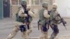 U.S.: Poll Finds Iraq War, Guantanamo Controversy Hurting Image Abroad