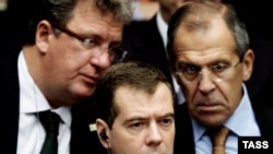 Foreign Minister Sergei Lavrov (right, with Russian President Dmitry Medvedev and Kremlin aide Sergei Prikhodko at the UN) accused governments of keeping Moscow out of the loop on Iran.