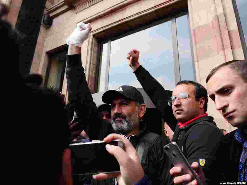 Opposition leader Nikol Pashinian emerges from the Marriott Hotel in Yerevan after meeting with Prime Minister Serzh Sarkisian on April 22.