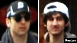 The suspects, Tamerlan (left) and Dzhokhar Tsarnaev, at the scene of the Boston Marathon bombings on April 15.